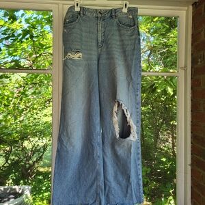 Garage Denim Urban Wide-Leg Jeans With Raw Hem and Distressed.